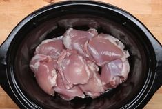 raw chicken in the slow cooker ready to cook