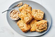 biscuits and dip on a plate with a spoon