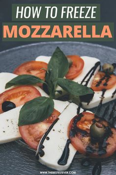 a plate with mozzarella, tomatoes and olives on it that reads ta mozzarellala maison