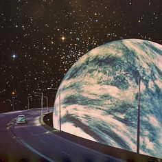 an image of a planet with cars driving around it