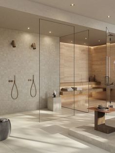 a modern bathroom with mirrors and sinks in it