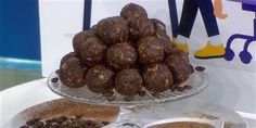 there are many different types of food on the table together, including chocolates and peanut butter