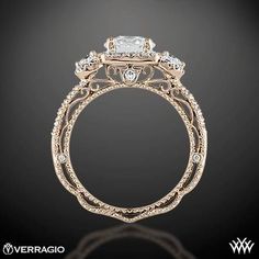 an intricately designed engagement ring with diamonds