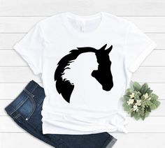 B224 Girl Who Loves Horses, Horse Girl, Horse Lover Shirt, Horse Riding, Horse Shirt, Horse Lover Gift, Gift for Her, Farm Lover Please aware that Unisex t-shirts are short-sleeved tees We use Bella + Canvas 3001 premium t-shirts which have a soft and light feel, It's very comfy and with its unisex sizing it's perfect for both men and women. BRAND & MATERIAL: Bella + Canvas - Unisex Short Sleeve Jersey Tee - 3001 Please note that the women's tee style is fitted. Some customers may wish to order Girl Horse, Riding Horse, Horse Shirt, Gifts For Horse Lovers, Design Lab, Horse Girl, High Quality T Shirts, Jersey Tee, Horse Lover