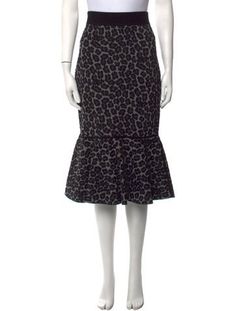 Michael Kors Collection SkirtBlackAnimal PrintRuffle EmbellishmentElasticized WaistFit:Skirts by Michael Kors Collection typically fit true to size. Michael Kors Clothes, Midi Length Skirts, Michael Kors Collection, Vintage Holiday Dress, Gray Skirt, Knee Length Skirt, Holiday Dresses, Sweater Accessories, Skirt Length