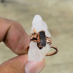 Note : Due to the natural formation of this gemstone. Slight variation in design and color are to be expected. Rose Quartz Rough Ring Smoky Quartz Ring Electroformed Copper Gemstone Ring Handmade Jewelry Adjustable Ring Copper Jewelry Gifts For Mother Handmade Electroformed Copper Ring SKU : VZR-89 Gemstone : 1: Rose Quartz                        2: Smoky Quartz Metal Purity : Copper Ring Size (in US) : Adjustable  support emotional and relationship healing. inspire compassion. boost feelings of peace and calm. Smokey Quartz disperses fear, lifts depression and negativity. It brings emotional calmness, relieving stress and anxiety. Promotes positive thoughts and action, and alleviates suicidal tendencies. Dispels nightmares and manifests your dreams. Smoky Quartz Jewelry, Electroformed Ring, Gifts For Mother, Smoky Quartz Ring, Rose Quartz Jewelry, Electroformed Jewelry, Copper Ring, Rose Quartz Ring, Quartz Jewelry