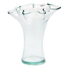 a clear glass vase with wavy lines on the top and bottom, sitting in front of a white background