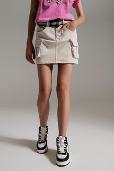 Q2 Cargo Mini Skirt in Beige Beige Skort With Pockets For Work, Mini Denim Skirt With Pockets, Utility Mini Skort With Pockets, Utility Mini Skirt For Summer, Utility Cotton Mini Skirt With Patch Pockets, Utility Style Cotton Cargo Mini Skirt, Utility Style Cotton Mini Cargo Skirt, Utility Mini Cargo Skirt With Multiple Pockets, Utility Mini Skort With Patch Pockets