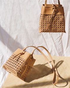 These woven tie cross-body bucket bags are gorgeous! Crochet Bag Ideas, Valentines Gift For Boyfriend, Contemporary Crochet, Designer Cosmetic Bag, Custom Handbags, Mini Bucket Bag, Stylish Purse, Wicker Bags, Mini Bucket Bags