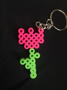 a keychain that has been made to look like an object with circles on it