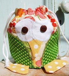 an owl purse is sitting on a table