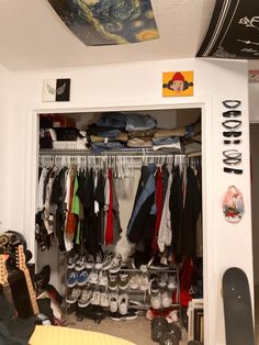 the closet is full of clothes and shoes for all kinds of people to use it