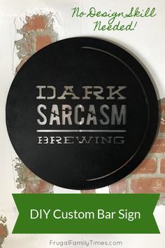 a sign that says dark sargasm brewing hanging on a brick wall with the words diy custom bar sign