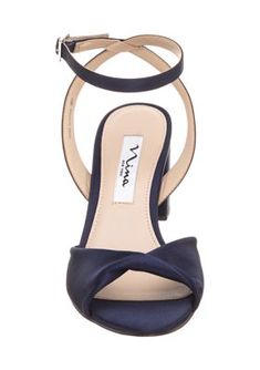 Lofted by a chunky block heel, these sandals from Nina are enhanced with an ankle strap for a secure fit. | Nina Women's Nigella Sandals, Navy Blue, 8M Navy Homecoming Dress, Bridal Party Accessories, Navy Heels, Navy Blue Shoes, Something Navy, Ankle Wrap Sandals, Blue Bridal, Chunky Block Heels, Ankle Wrap