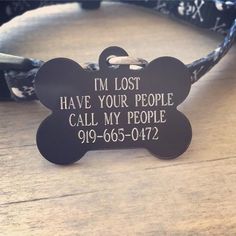 a dog tag that says i'm lost have your people call my people