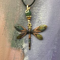 "Copper Dragonfly Pendant Necklace - Colorful Copper Dragonfly Necklace Each piece is unique, using a flame painting technique, creating a rainbow of colors that will easily compliment any outfit. Pendant measures approximately 1.75\" x 1.5\"" Drangfly Necklace, Dragonfly Jewelry Necklaces, Flame Painting, Dragonfly Gifts, Copper Anniversary, Dragonfly Jewelry, Necklace Colorful, Lovers Necklace, Dragonfly Necklace