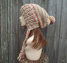 "Style: Charlotte - a slouchy beanie pom pom hat. Color: This sample hat is shown in Jam Cookie, tan mixed with cherry red, eggplant and slate grey. Sizes: One size fits average teen or adult head size of 20\" to 23\" (50.5 cm to 58 cm). Fiber Content: 80% acrylic, 20% Wool Characteristics: Chunky, very soft, warm and cozy. Care Instructions: Hand wash, dry flat. Every item from Pixiebell is handmade and knit or crocheted to order, unless otherwise stated in title of the item as \"ready to ship\ Hat Pom Pom, Fall Fashion Accessories, Hats Winter, Womens Hats, Chunky Knit Hat, Mens Hat, Slouchy Beanie Hat, Pixie Hat, Handmade Knitwear