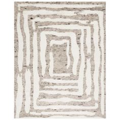 an abstract rug with white and grey stripes