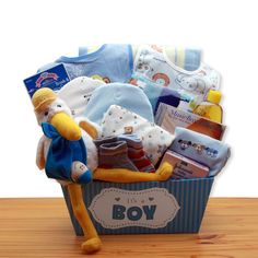 a baby boy gift basket filled with toys