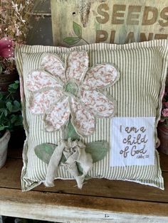 a pillow that has some flowers on it