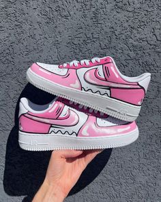 The Pink Cartoon Custom Air Force 1 shoes are made from high-quality materials and feature a unique pink cartoon design. They offer superior comfort and durability, making them perfect for everyday wear. The design is stylish and eye-catching, and is sure to turn heads. Exactly as shown in the pictures. 📷 Brand New & Authentic. 💯 Hand Painted with attention to detail. 👨‍🎨 Waterproof and Flexible. ❤️ Unisex model. Please refer to the Size Chart. 👟👫 Free Worldwide Shipping. ✈️🌍 Pink Air Force 1, Custom Sneakers Diy, Air Force 1 Sneakers, Pink Cartoon, Custom Painted Shoes, Custom Shoes Diy, Nike Shoes Air Force, Painted Sneakers, Nike Fashion Shoes