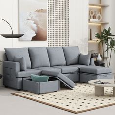 a living room scene with focus on the sectional sofa and storage ottoman, which also has a coffee table