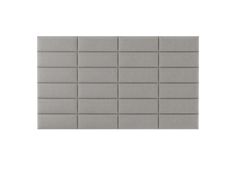 a gray tile wall with squares on it