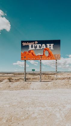 a large sign in the middle of nowhere