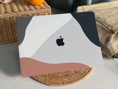 an apple computer sitting on top of a table