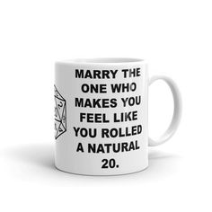 a coffee mug with the words marry the one who makes you feel like you rolled a natural 20