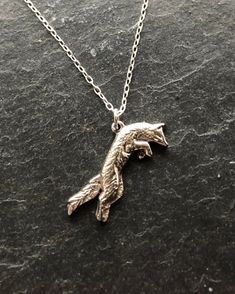 Individually handcrafted, sterling silver jumping fox pendant. Comes with 16", 18" or 20" sterling silver trace chain. Jumping Fox, Fox Necklace, Foxes Necklace, Fox Pendant, Silver Fox, Star Necklace, Handmade Sterling Silver, Sterling Silber, Pendant Necklaces