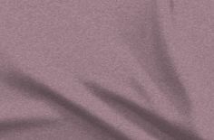 a close up view of a plain fabric material in lilac purple, which is very soft