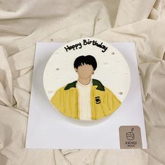 a birthday card with a photo of a man in yellow jacket on top of a white sheet