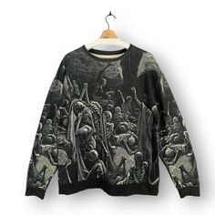 Step up your style with this Unique Gothic Skeleton Sweatshirt. Perfect for those who love bold and macabre artwork, this black sweatshirt features a detailed monochromatic skeleton design that stands out. Made from soft, high-quality fabric, it ensures both comfort and durability, making it ideal for various occasions. Key Features: ❤ INTRICATE DESIGN: Features an elaborate and detailed skeleton artwork. ❤ MONOCHROMATIC STYLE: The design in black and white adds a classic gothic touch. ❤ COMFORTABLE WEAR: Made from soft, high-quality fabric for maximum comfort. ❤ SIZE: Large (L) - Please refer to measurements for accurate sizing. ❤ DURABLE MATERIAL: Ensures long-lasting wear even with frequent use. Why You'll Love It: ❤ GOTHIC AESTHETIC: Perfect for fans of gothic and macabre fashion. ❤ VE Skeleton Artwork, Monochromatic Style, Gothic Skeleton, Skeleton Sweatshirt, Monochromatic Design, L Design, Skeleton Design, Gothic Aesthetic, Black Sweatshirt