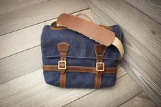 Bourbon Messenger Bag- Steurer & Jacoby Brown Waxed Canvas Briefcase With Luggage Sleeve, Waxed Canvas Laptop Bag With Leather Trim, Satchel Shape, Brown Waxed Canvas Briefcase With Adjustable Strap, Golf Shoe Bag, Military Style Travel Bag With Adjustable Strap, Nantucket Red, Military Messenger Bag, Golf Gifts For Men, Chestnut Leather