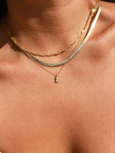 "This delicate and dainty piece will make the perfect minimal accessory for jewelry lovers. It features a small dainty, cubic zirconia that shines brightly, and its cable chain adds a subtle sparkle every time you move. * Single Chain with charm * 14k Gold Filled * Cubic Zirconia * Chain Length: 17\" + 1\" extender ( to make adjustable to wear at different lengths) ►GOLD FILLED: Our gold filled jewelry has an outer layer of entirely 14k or 18k gold that is pressure-bonded to a jewelers brass bas Delicate Tiny Charm Necklaces For Wedding, Delicate 14k Gold Charm Necklace For Wedding, Delicate 14k Gold Filled Chain Necklace, Dainty Charm Necklaces With Delicate Chain, Dainty Charm Necklace With Delicate Chain, Elegant Tiny Charm Necklaces For Wedding, Delicate Tiny Necklaces For Wedding, Delicate Tiny Wedding Necklaces, 14k Gold Charm Necklaces With Delicate Chain For Wedding