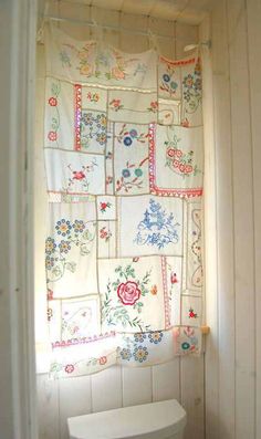 an open door with a floral curtain in it