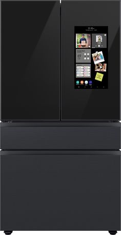 a black refrigerator freezer with an appliance on the front and two doors