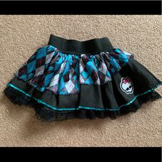 Monster High Frankie Multi Layer Lace Trim Halloween Costume Skirt No Tags, But Never Worn - Like New Size - 6-10 Lace Hem Sequins Trim Layered Puffy Elastic Waist 100% Polyester Rn #122945 Ships From A Smoke Free, Pet Free Home Cute Fitted Mini Skirt For School, Fitted Tiered Skirt For School, Playful Mini Skirt For School, Cute Fitted Skirt For School, Cute Black Party Skirt, Cute Fitted Black Skirt, Cute Black Mini Skirt For Party, Cute Black Skort For Summer, Cute Black Summer Skort