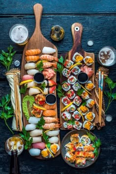 sushi platter with chopsticks and other food items on the table top view from above