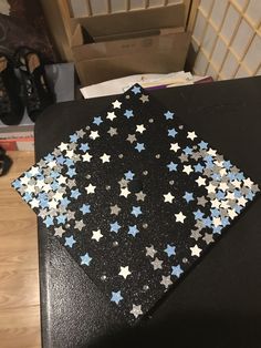 a black table with blue and silver stars on it