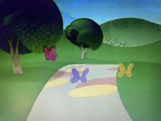 an animated image of a park with trees and butterflies