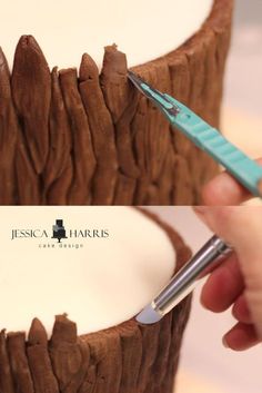 a person is using a pen to paint the inside of a chocolate cup