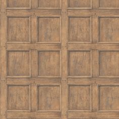 a wooden paneled wall with square and rectangle design