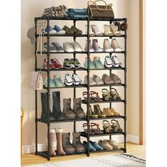 the shoe rack has many pairs of shoes on it