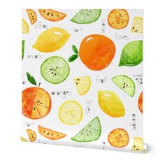 an image of fruit wrapping paper on a white background with oranges, limes and lemons