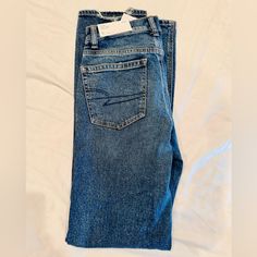 American Eagle High Rise Straight Stretch Jean 25w 0long New With Tags Ripped At Knee High Waisted Baggy Jeans, American Eagle Mom Jeans, Ripped Mom Jeans, Distressed Mom Jeans, Jean Color, Jeans American Eagle, Curvy Jeans, High Rise Mom Jeans, Black Denim Jeans