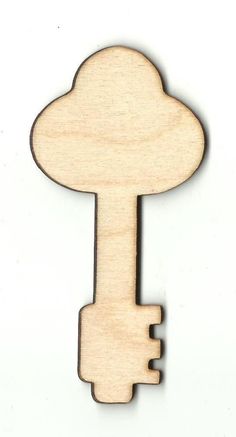 a wooden key that is shaped like a cloud and has the shape of a hand on it