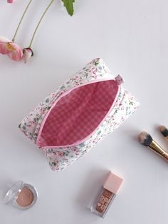 "This cute and floral makeup bag will help you in many ways. You can put your makeup in this toiletry bag when you are at a party or out. You can make a loved one happy by gifting it to a friend. If you are going to travel, you can put your cosmetic bag in your suitcase and prevent your make-up materials from being messy.You can use it as a pencil case when going to school.🌸 🧺Materials: Cotton fabric is used in the outer and inner fabric. There is a fiber fabric between the two, so we have a f Pink Zipper Pouch For Cosmetics And Toiletries Gift, Pink Cosmetic Storage Zipper Pouch As Gift, Pink Cosmetic And Toiletry Storage Zipper Pouch As Gift, Pink Cosmetic Storage With Removable Pouch, Pink Gift Cosmetic And Toiletry Storage With Zipper, Everyday Pink Zipper Pouch For Cosmetics And Toiletries, Everyday Pink Cosmetic Zipper Pouch, Handmade Makeup Bag, Floral Makeup Bag