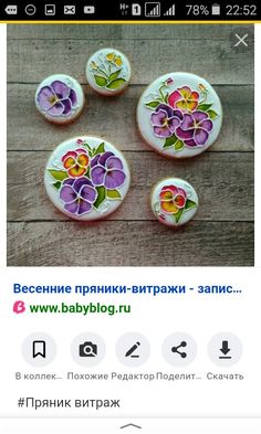 some flowers are painted on the back of these buttons